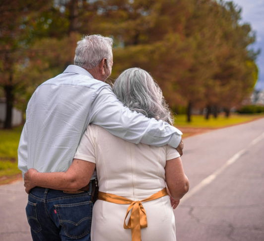 couple-kissing-on-the-road-during-daytime.jpg couple kissing on the road during daytime